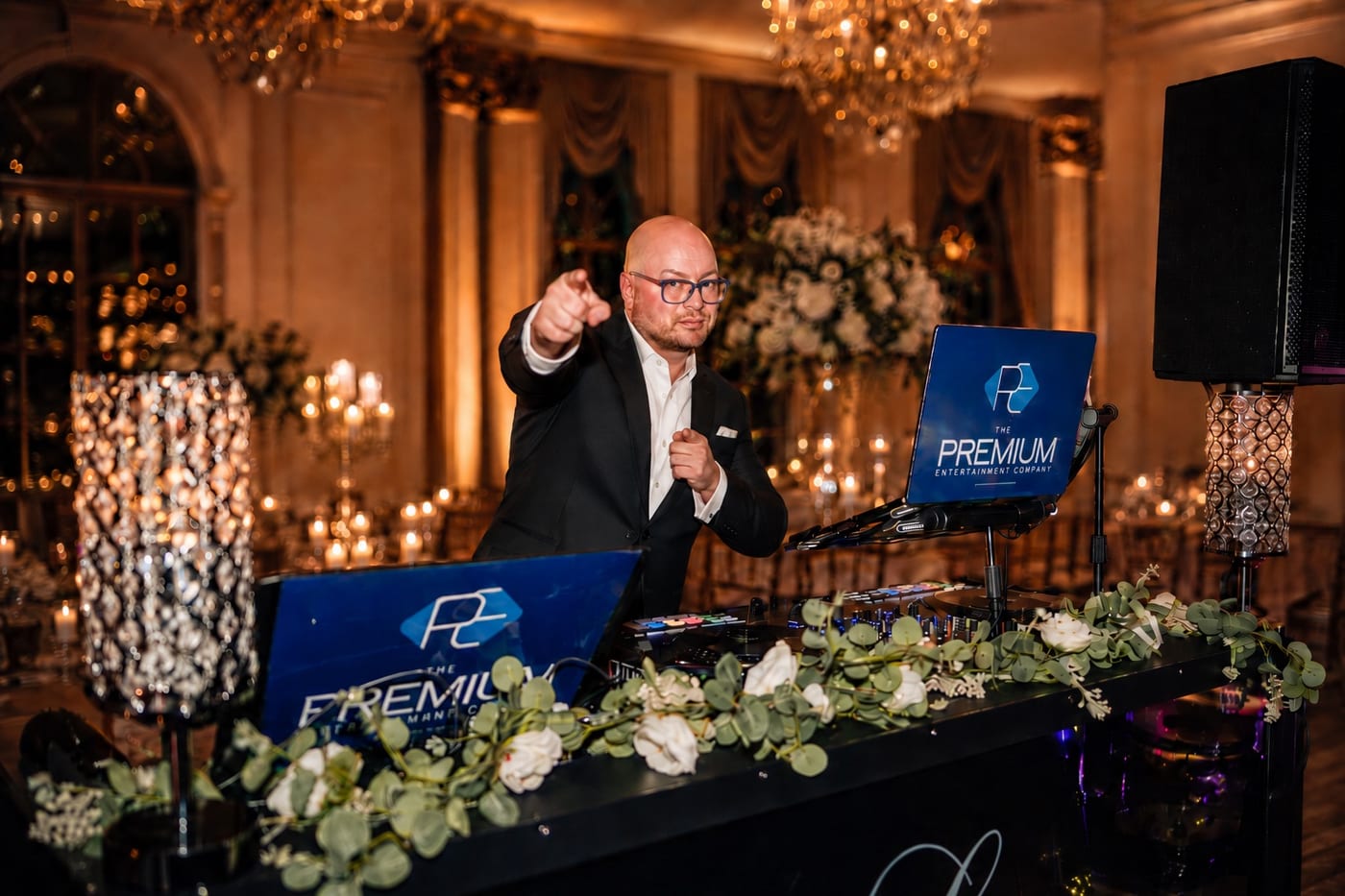 Anthony DeStefano at the DJ booth at an elegant wedding reception
