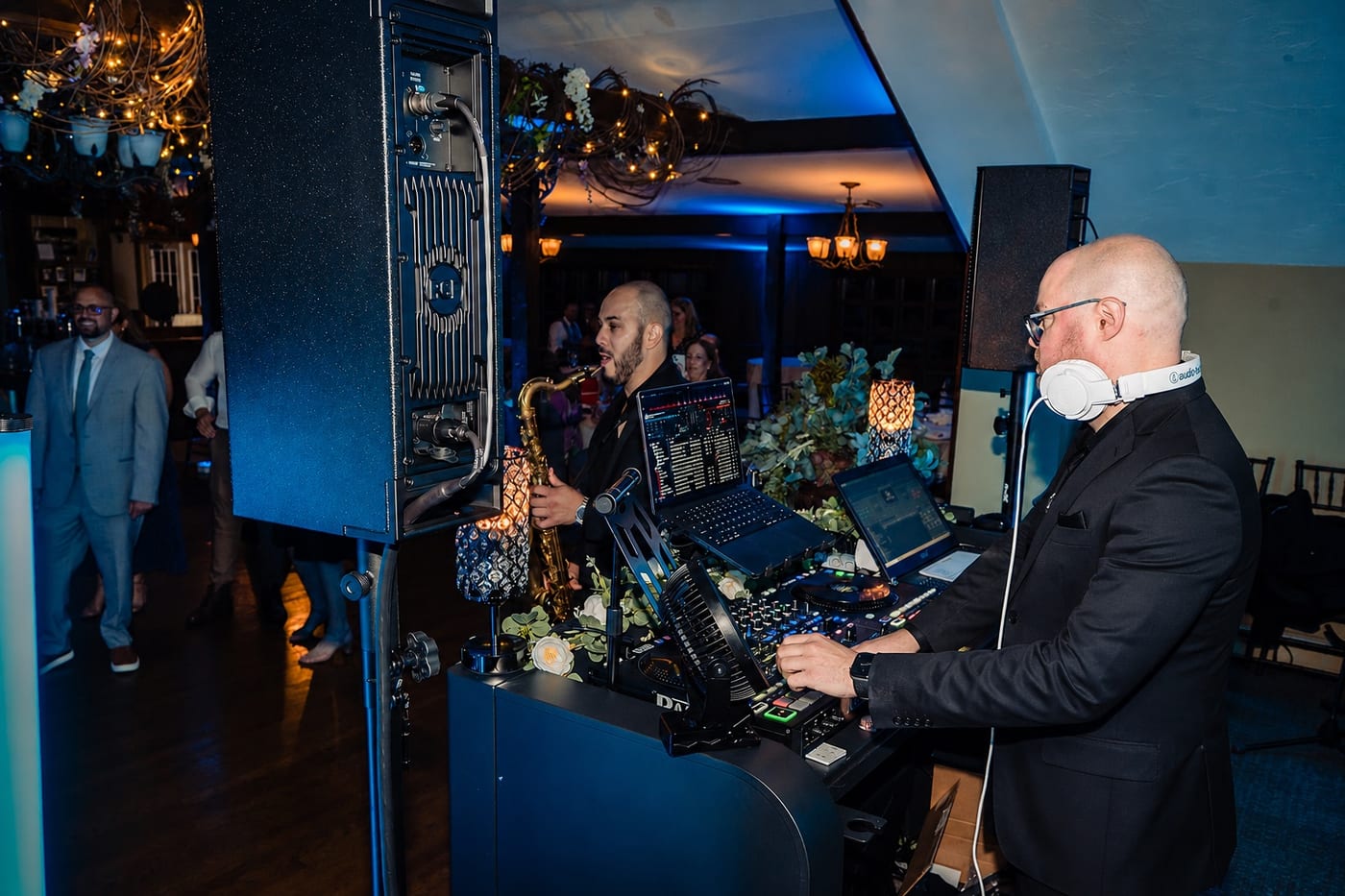Anthony DeStefano DJing alongside a saxophonist at Woodsgate