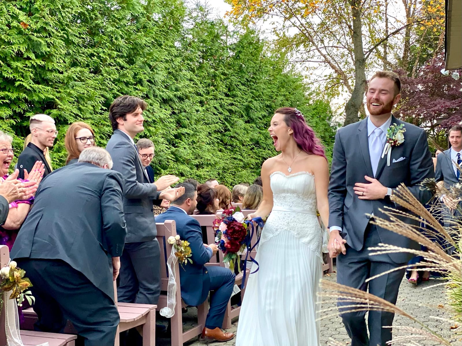 Outdoor wedding ceremony seating and floral arch at Black Bear Golf Club, Crystal Springs Resort