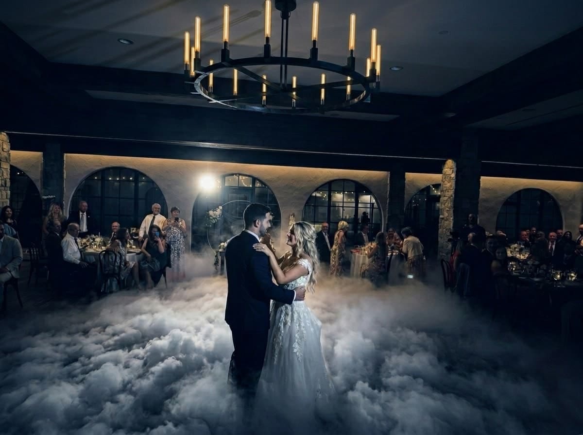 Dancing on clouds first dance at Perona Farms with dramatic lighting