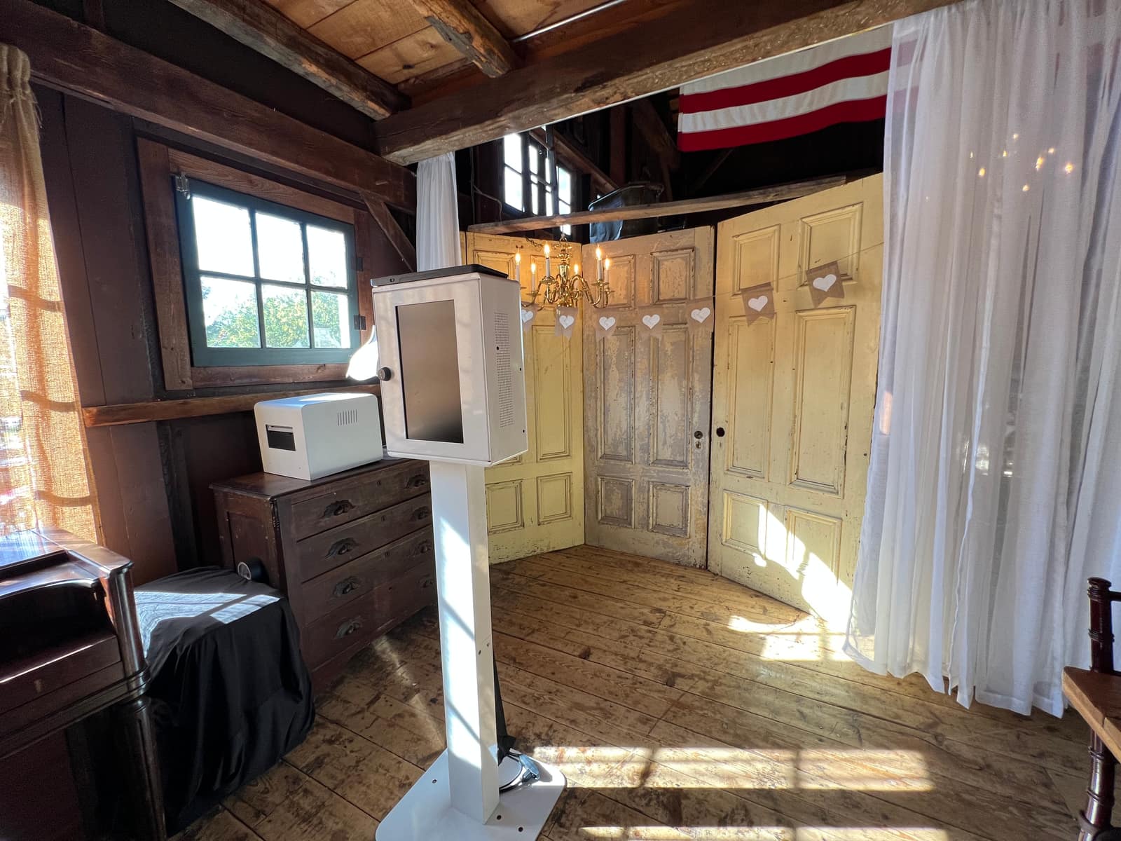 Guests enjoying the photo booth at a Jack's Barn wedding in Oxford, NJ