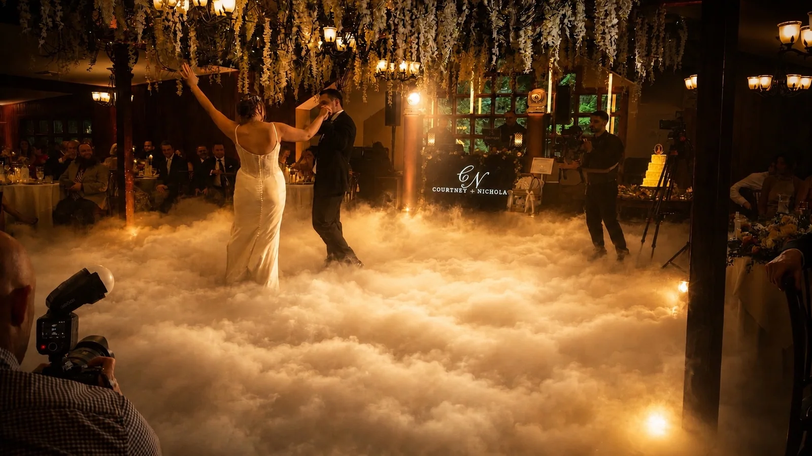 Courtney and Nick sharing their first dance with a dancing-on-the-clouds effect at Woodsgate at Stroudsmoor by Wedgewood Weddings