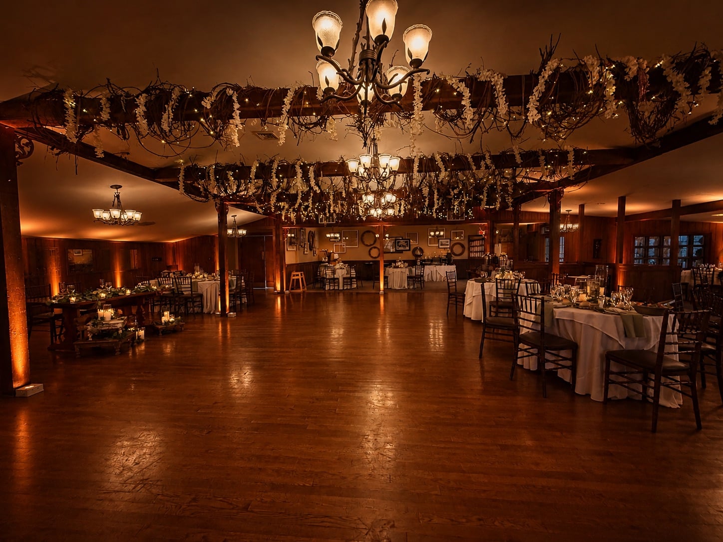 Woodsgate at Stroudsmoor by Wedgewood Weddings with Premium Entertainment amber uplighting along the wood beams and stone walls